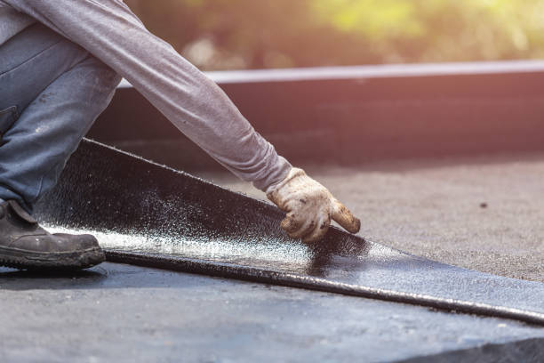 Professional Waterproofing technician working in Huntersville, NC